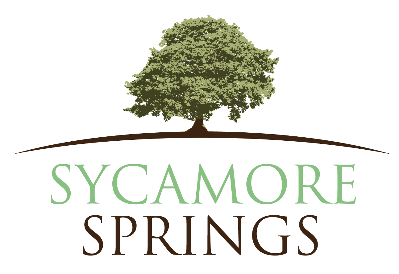 the logo or sign for the tree